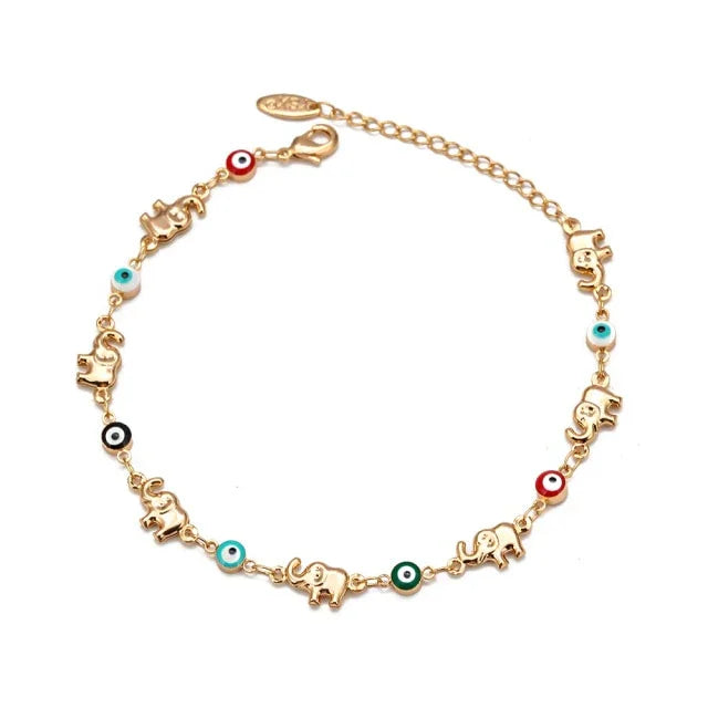 Gold elephant charm bracelet with colorful evil eye beads, adjustable chain, minimalist jewelry