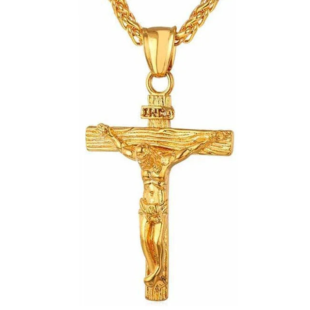 Gold crucifix pendant with chain featuring detailed Jesus figure, religious jewelry