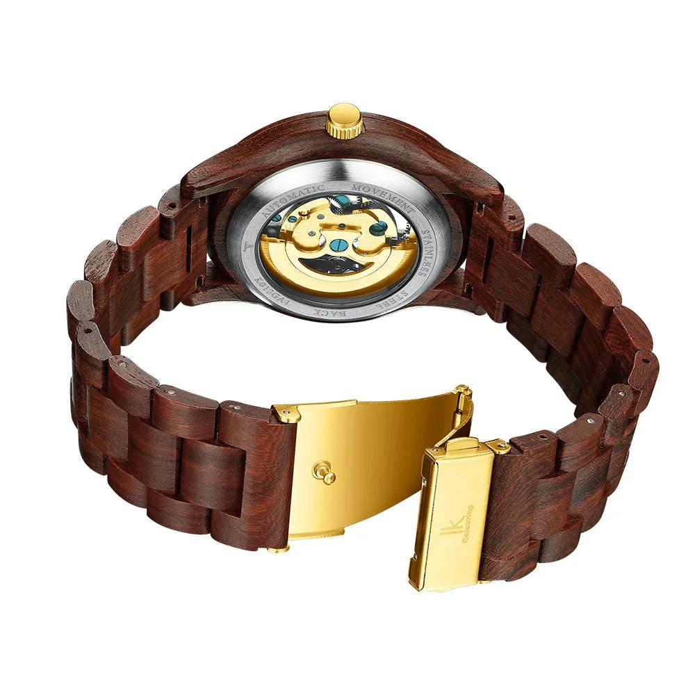 Wooden bracelet with gold clasp and visible metal accents, modern design