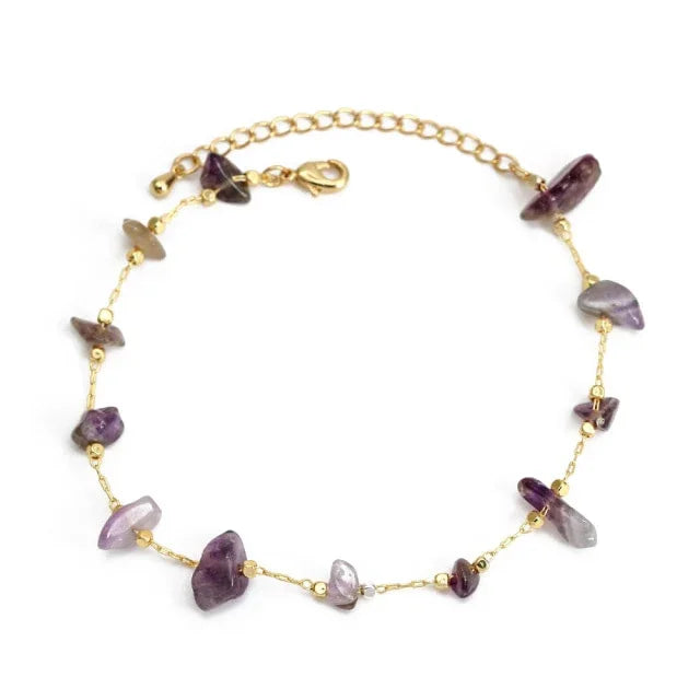 Gold chain bracelet with purple gemstone chips and adjustable clasp, elegant jewelry gift